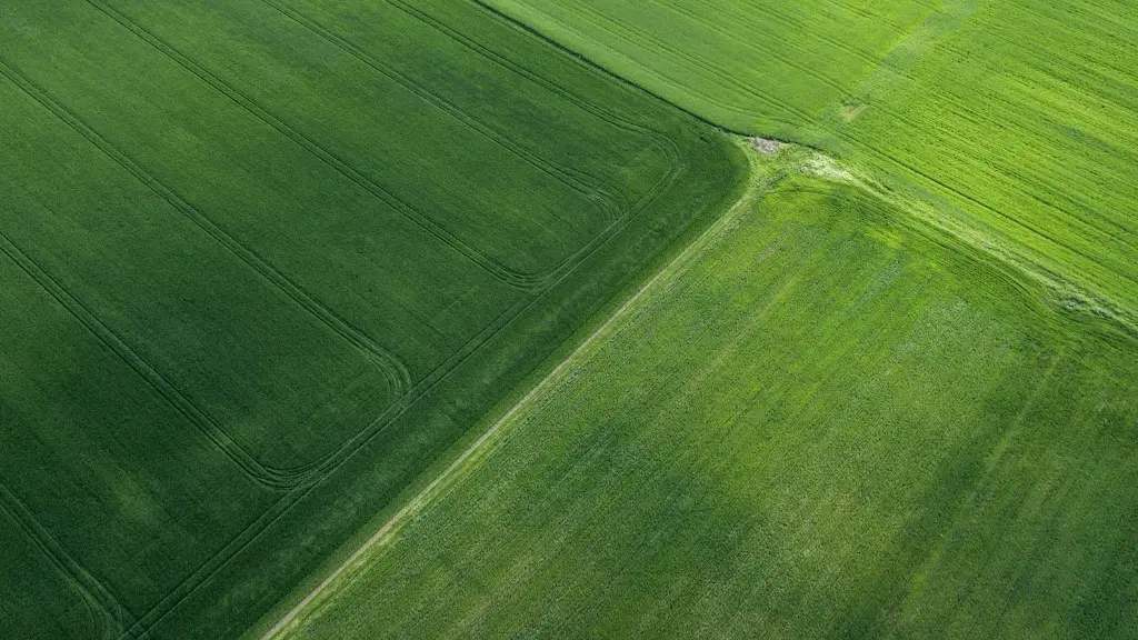 Where is draining wetlands agriculture practiced?